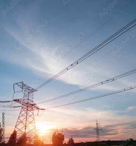 Electrical substation silhouette on the dramatic sunset background