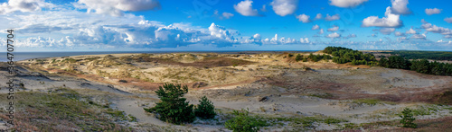 Panoramic view of sand dunes and blue sky in a summer morning. the Dune Epha's Height, Curonian Spit National Park, Russia
