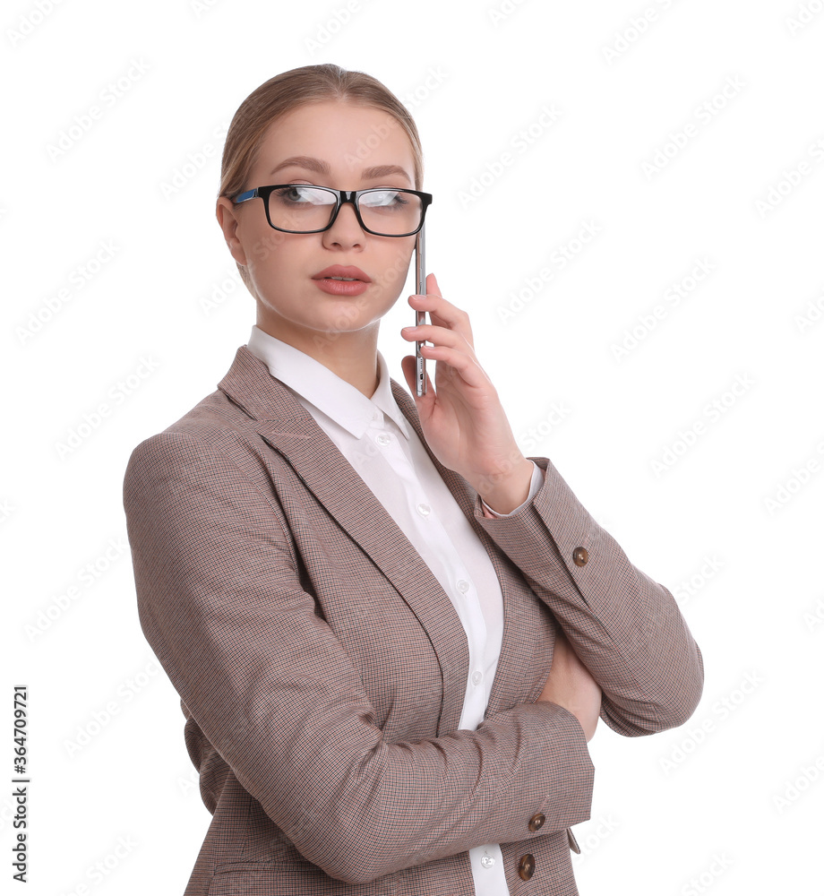Young businesswoman talking on mobile phone against white background Young businesswoman talking on mobile phone against white background