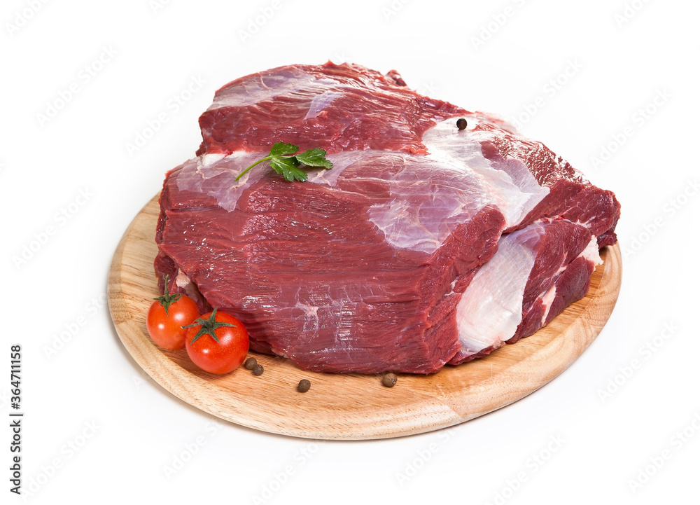 raw beef on the cutting board isolated on the white background. raw beef on the cutting board isolated on the white background.