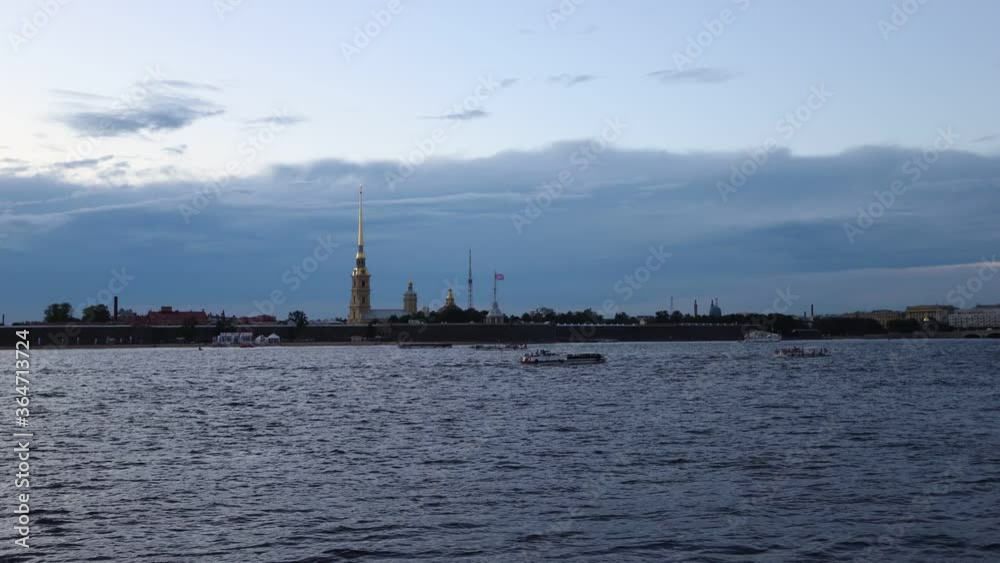 Traffic pleasure boats on the Neva in St. Petersburg on the background of the Peter and Paul Fortress Traffic pleasure boats on the Neva in St. Petersburg on the background of the Peter and Paul Fortress
