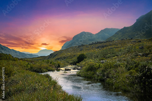 Fototapeta Naklejka Na Ścianę i Meble -  Hottentots Holland Mountains river and sunset in Overberg western cape South Africa
