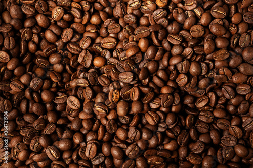 Background coffee beans. Pattern of brown roasted coffee bean beans