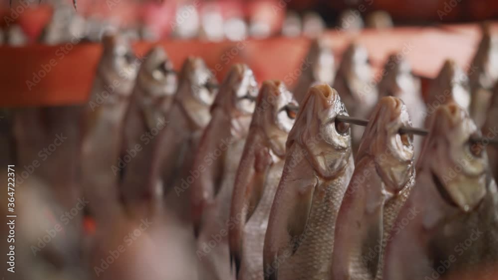 Processing dried fish at a fish factory. Fish drying. fish seafood factory Processing dried fish at a fish factory. Fish drying. fish seafood factory