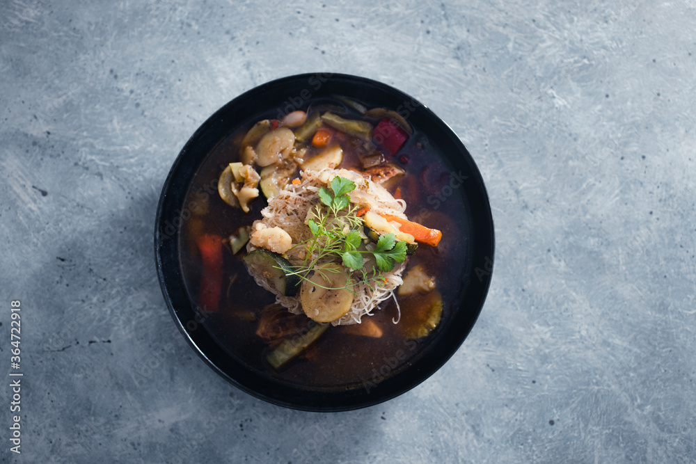 plant-based food, vegan noodles soup with mixed stir fry vegetables