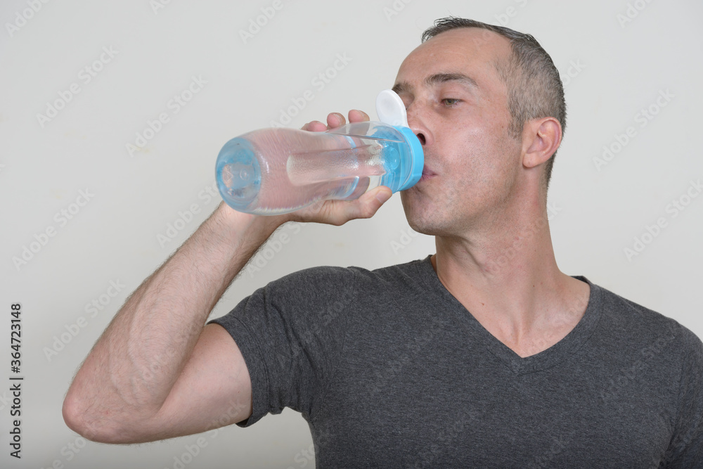 Portrait of mature handsome man ready for gym Portrait of mature handsome man ready for gym