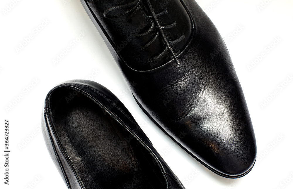 A pair of leather elegant shoes on a white background A pair of leather elegant shoes on a white background