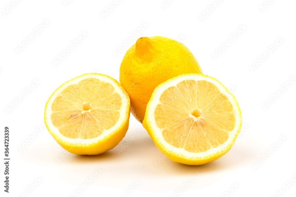 Group of lemons in close up, isolated on white background