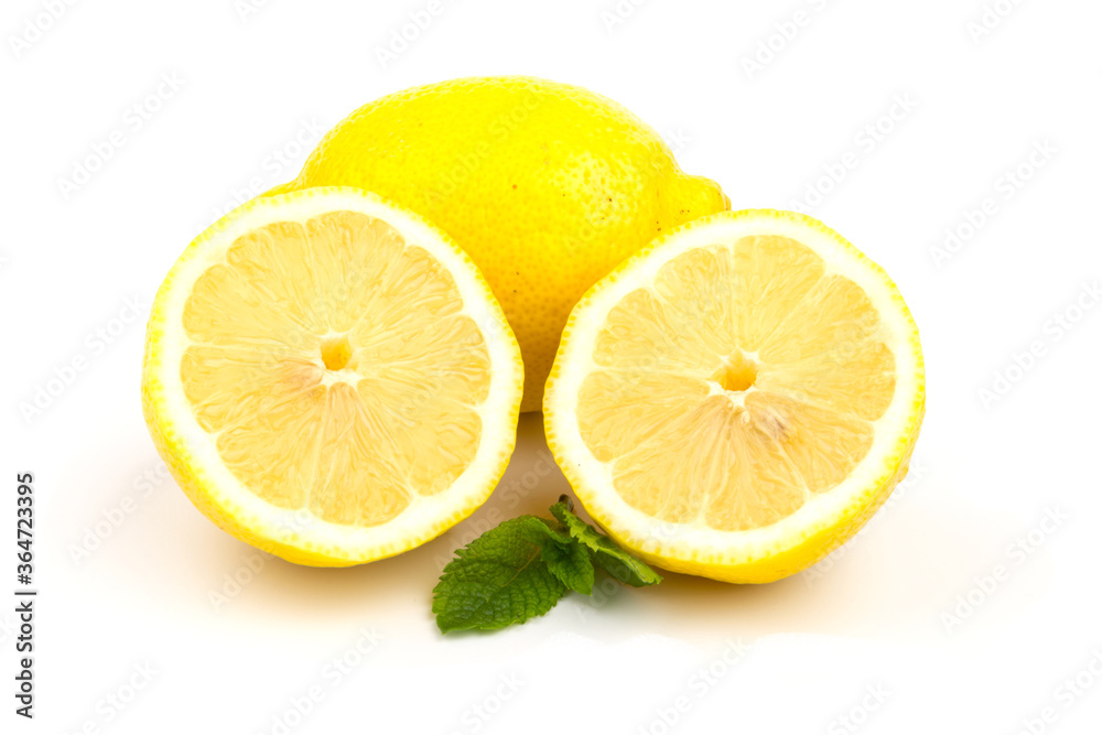 Group of lemons with mint leaves, isolated on white background