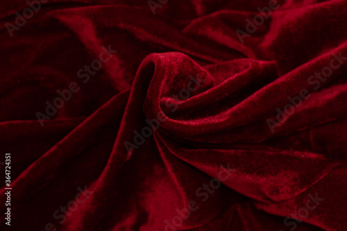 Abstract texture of crumpled red velvet background