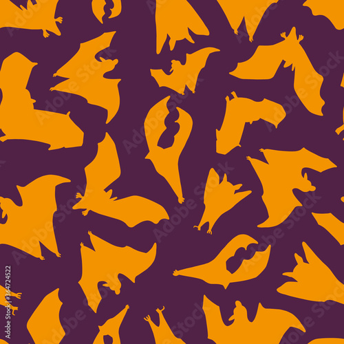 Seamless pattern of bats.Silhouette of orange bats on a purple background. Design for Halloween. Vector illustration © Tatyana Olina