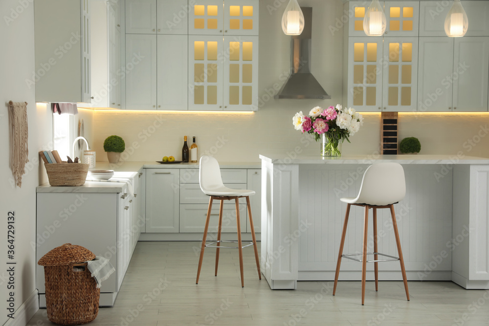 Fototapeta premium Modern kitchen with stylish furniture. Interior design