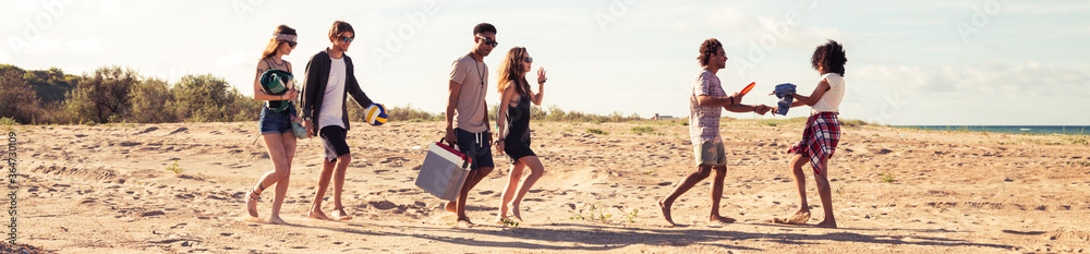 Amazing young group of friends walking outdoors Amazing young group of friends walking outdoors