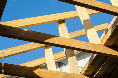 wooden frame of beams for the roof of the house. construction of houses