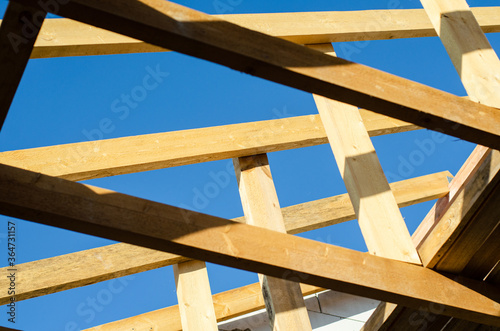 wooden frame of beams for the roof of the house. construction of houses