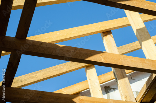 wooden frame of beams for the roof of the house. construction of houses