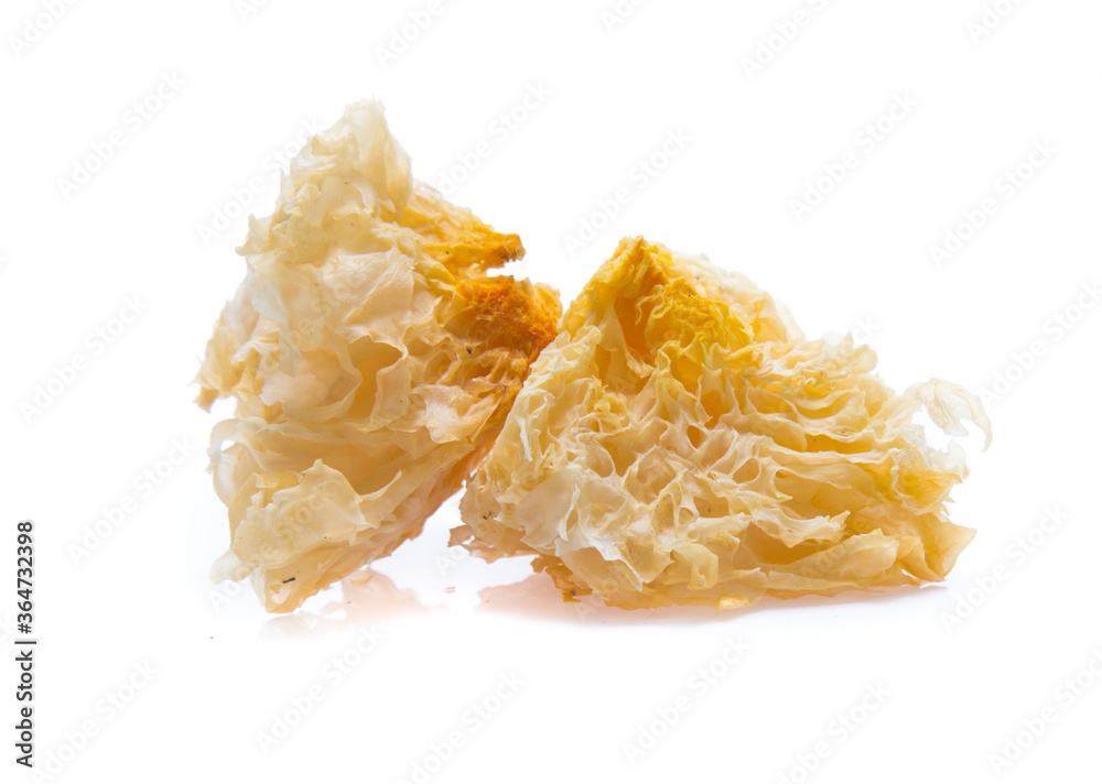 White jelly fungus, snow fungus, traditional chinese herbal medicine isolated on white background White jelly fungus, snow fungus, traditional chinese herbal medicine isolated on white background