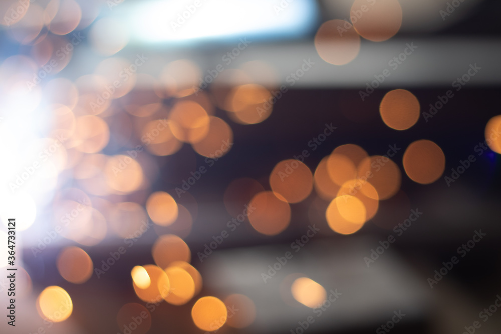 Fototapeta premium Gold abstract bokeh background, Festive xmas abstract background with bokeh defocused lights and stars