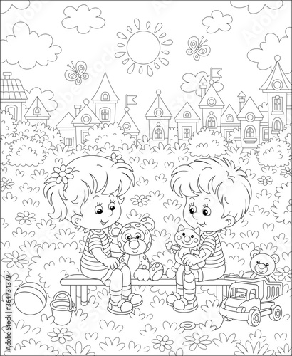 Cheerful small children sitting on a bench, talking and playing with their funny toys on a summer playground in a park, black and white outline vector cartoon illustration for a coloring book page