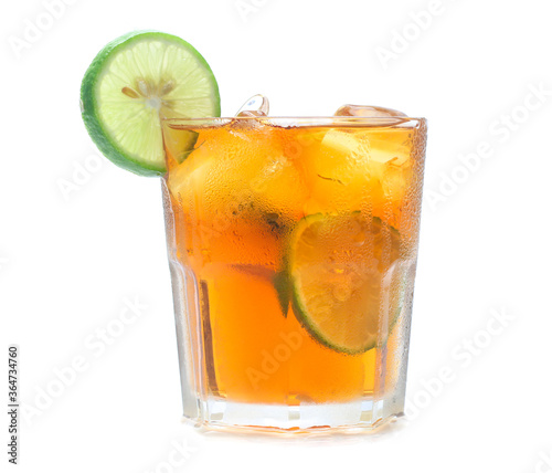 glass of iced tea with lemons isolated on a white background