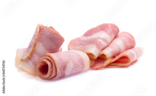 Fresh sliced bacon on white background