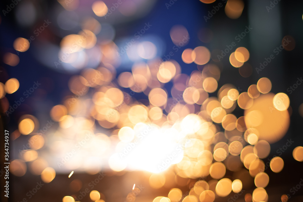 Gold abstract bokeh background, Festive xmas abstract background with bokeh defocused lights and stars Gold abstract bokeh background, Festive xmas abstract background with bokeh defocused lights and stars