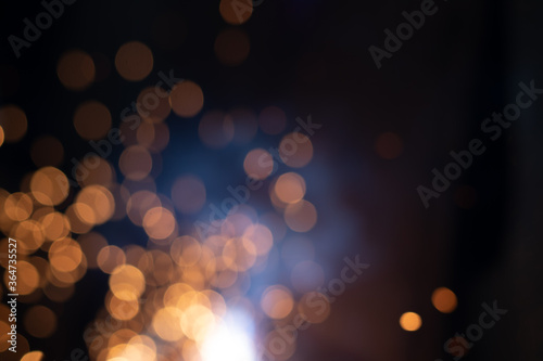 Gold abstract bokeh background, Festive xmas abstract background with bokeh defocused lights and stars