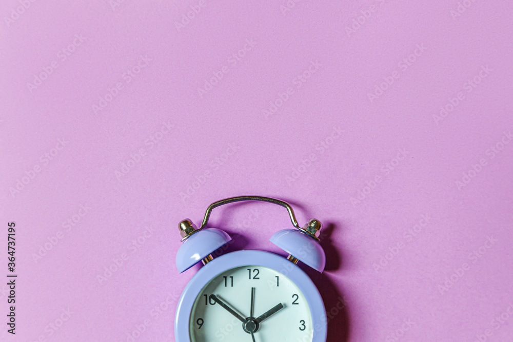 Simply minimal design ringing twin bell vintage classic alarm clock Isolated on purple violet background. Rest hours time of life good morning night wake up awake concept Flat lay top view copy space - obrazy, fototapety, plakaty 