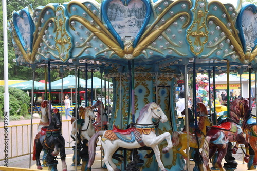 kids carousels in belarusian city park © Mikalai Drazdou