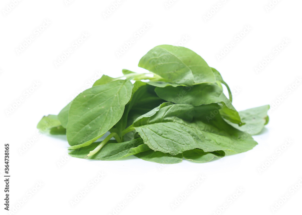Spinach leaves close up isolated on white Spinach leaves close up isolated on white