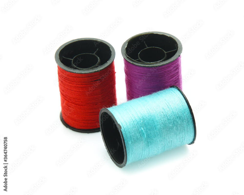 Colorful yarn on spool, yarn on tube, cotton, wool, linen thread Colorful yarn on spool, yarn on tube, cotton, wool, linen thread