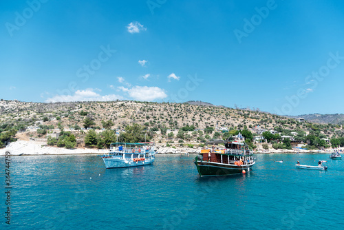 Beautiful bay in Greece with traditional boats. Touristic boat tour