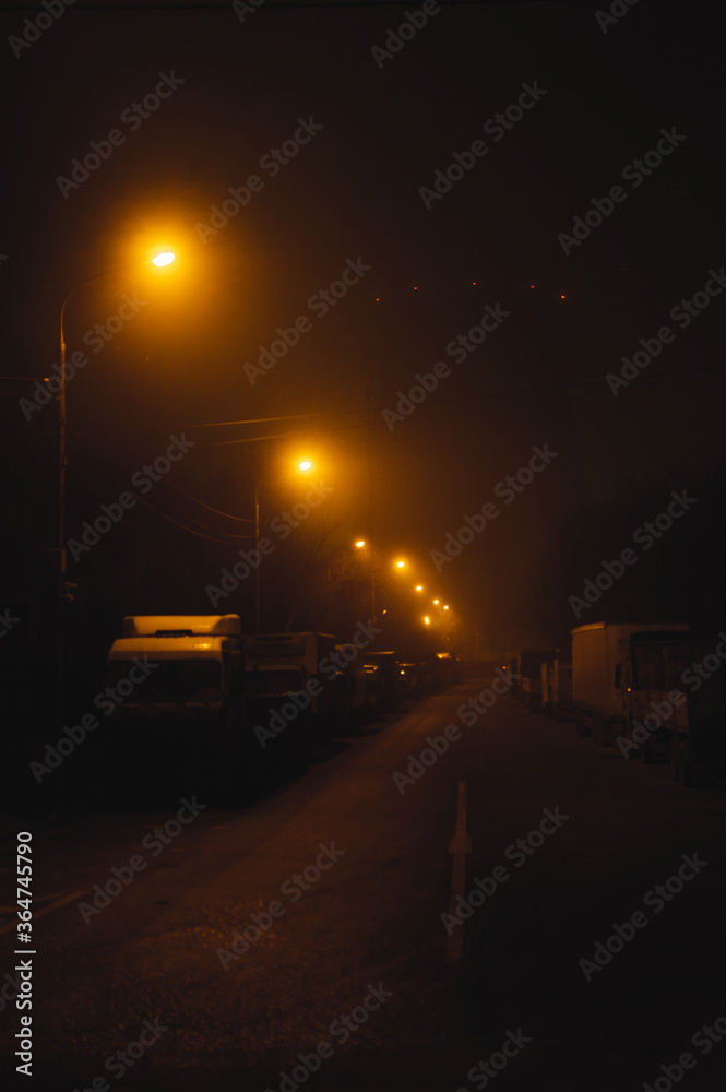 Obraz premium cars on the road at night