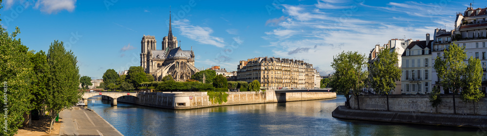 Morning panoramic view of Notre Dame de Paris cathedral and the Seine River Banks (UNESCO World Heritage Site). Ile de la Cite, Ile Saint-Louis, Paris, France