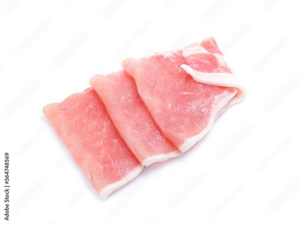 Raw pork meat with parsley herb leaves isolated on white background Raw pork meat with parsley herb leaves isolated on white background