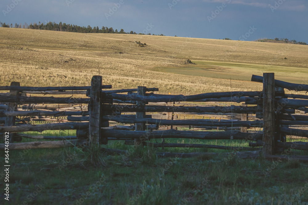 beautiful view of fields and old wooden fence