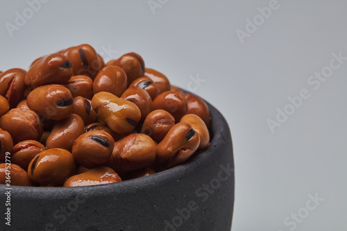 Fava beans (foul) shot on white background.