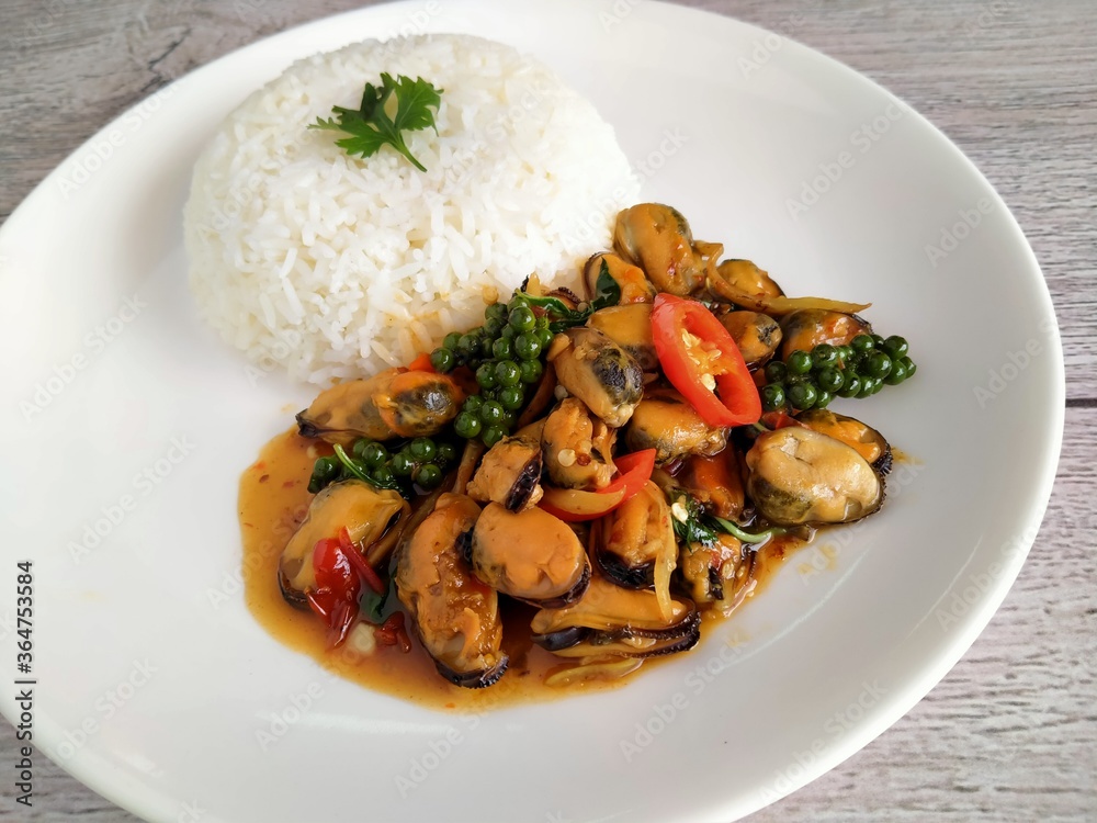 Mussels with basil on a plate that looks delicious Mussels with basil on a plate that looks delicious