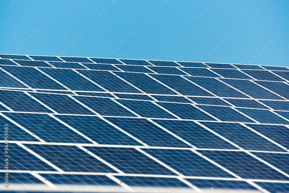 Group of solar panels with blue sky background Group of solar panels with blue sky background