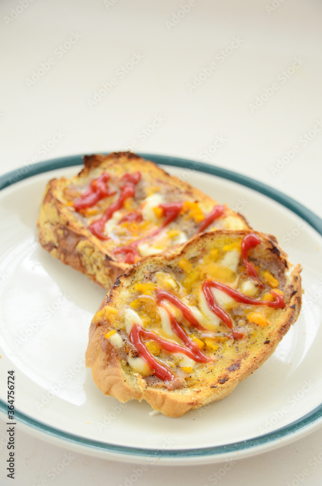 Toast with cheese, mayo and tomatoes sauce. Toast with cheese, mayo and tomatoes sauce.