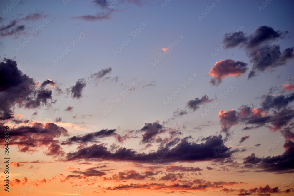 Blue sky with beautiful blue red clouds in the evening