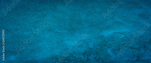 dark blue background with grunge background texture © arwiyada