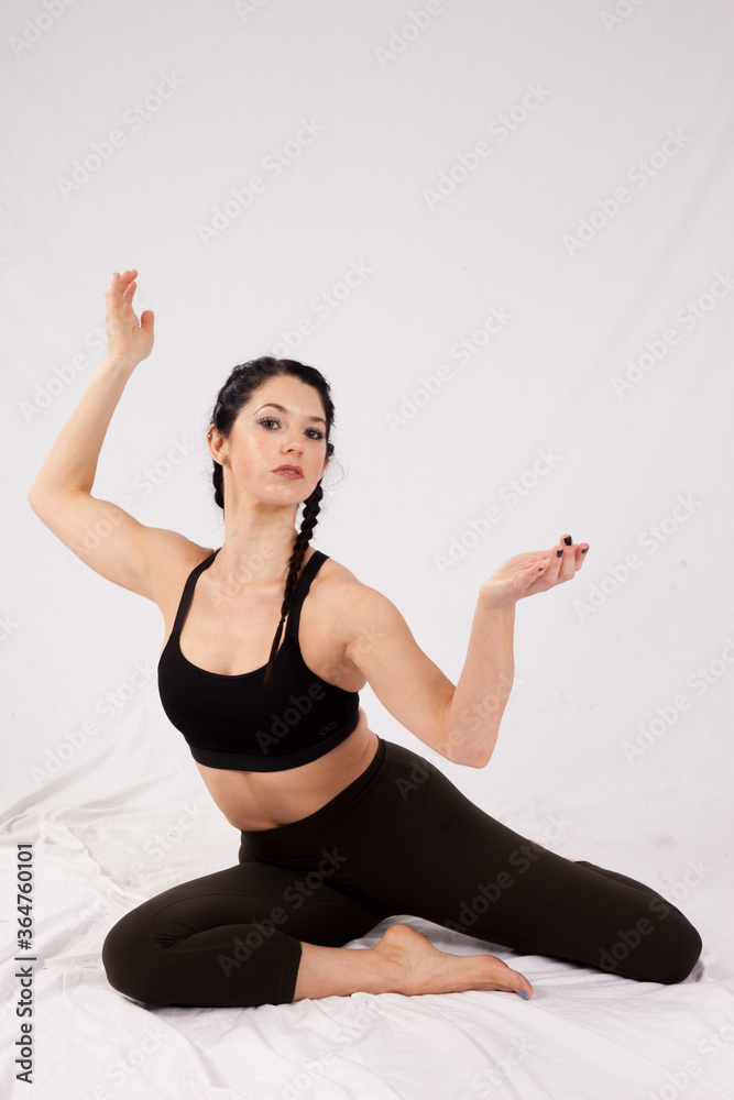 Beautiful woman sitting on the floor Beautiful woman sitting on the floor