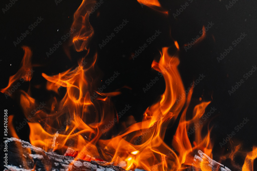 burning firewood in a barbecue or barbecue. burning firewood in a barbecue or barbecue.