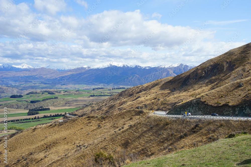 The Crown Range lies between Queenstown and Wanaka. The road over the range, known as the Crown Range Road, is the highest main road in New Zealand. 