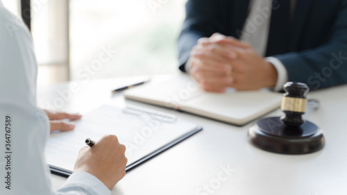 Lawyer consultant team working together with lawsuit.