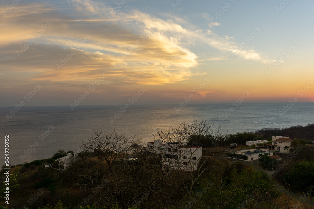 yellow clouds at golden hour over ocean lookout yellow clouds at golden hour over ocean lookout