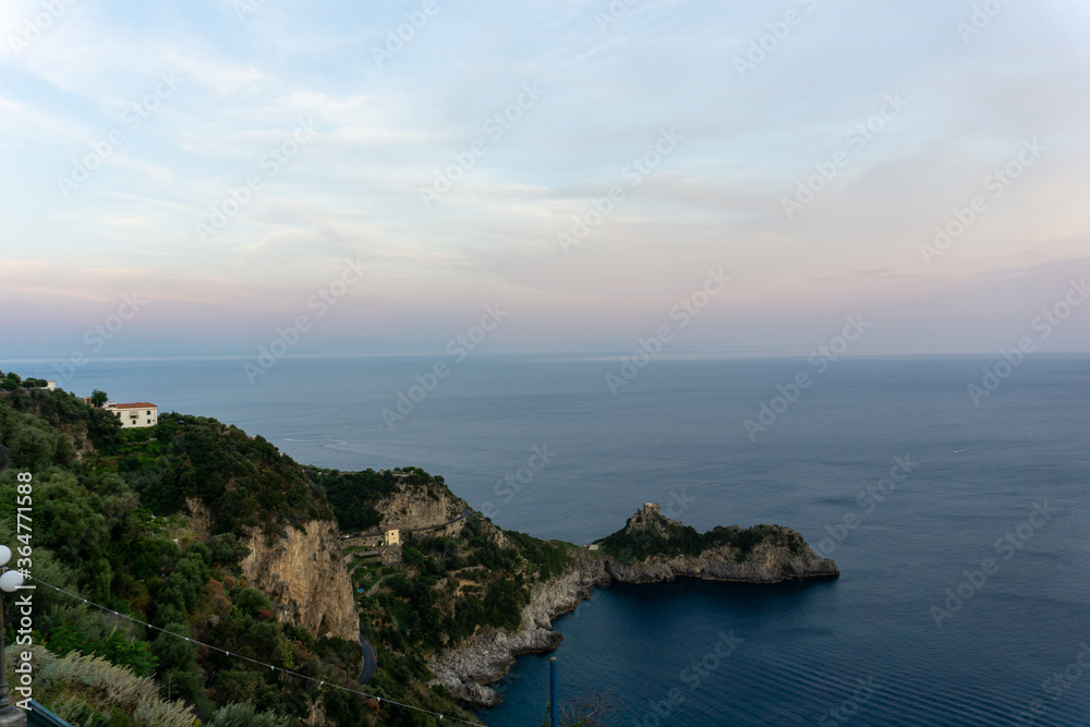 coastline surrounded by sea at sunset coastline surrounded by sea at sunset