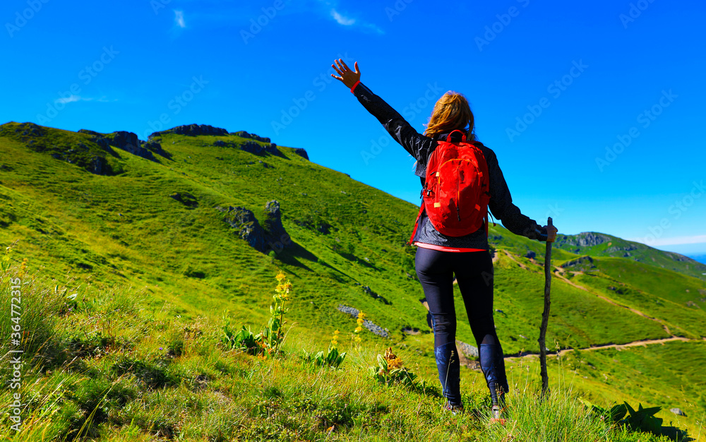 woman hiking on the mountain in France, Cantal