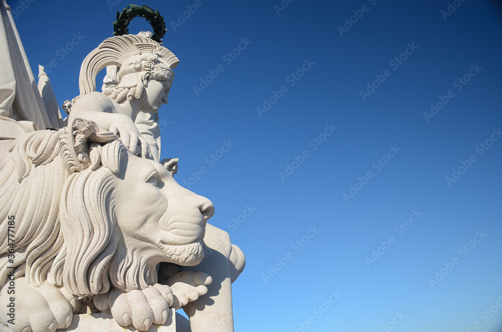 Detail of a statue of Rua Augusta Arch, a historical building in Commerce Square (Praca do Comercio), Lisbon, Portugal Detail of a statue of Rua Augusta Arch, a historical building in Commerce Square (Praca do Comercio), Lisbon, Portugal